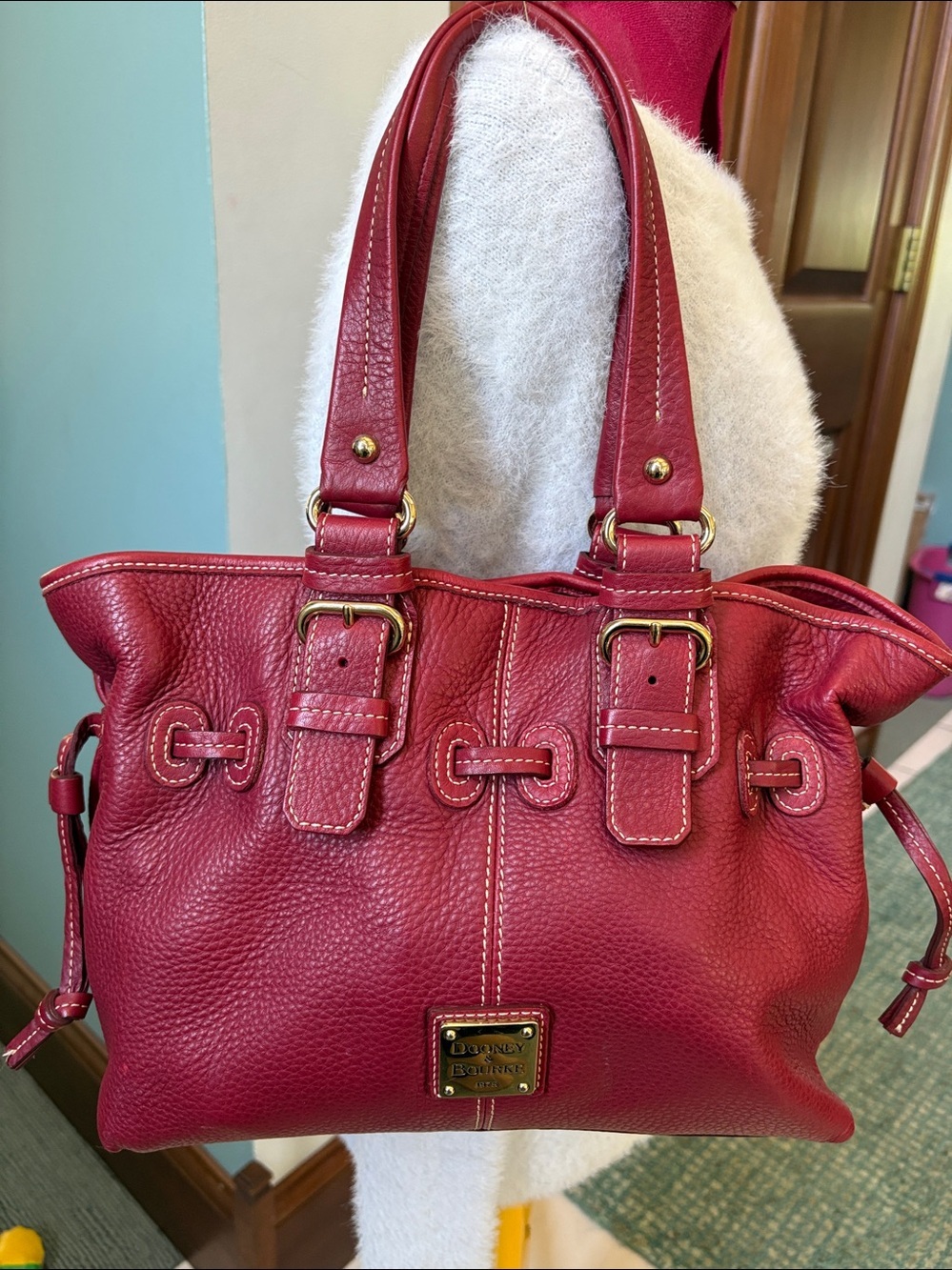 Dooney & Bourke  shoulder bag
Pebbled Leather red  drawstring top  excellent